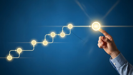 A hand drawing a rising graph with glowing nodes against a blue background