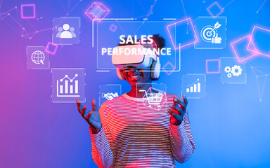 A joyful woman wearing a VR headset engages with digital graphics showcasing data analytics and sales performance, emphasizing innovative marketing strategies in a modern environment. XDMCP
