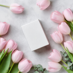 Empty White Box Mockup with Pink Tulips on Marble Surface