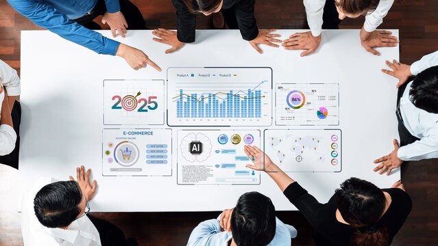 A diverse group of business professionals collaborates on e-commerce strategies, analyzing data and artificial intelligence projections for 2025 in a modern workspace setting. Raster - Powered by Adobe