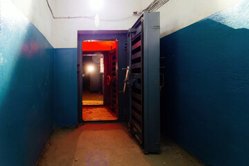 Entrance to bomb shelter protective construction of civil defense. Large armored blast proof iron...