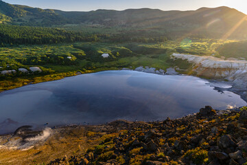 Stunning landscape at a tranquil lake surrounded by mountains in Russia