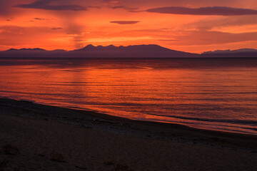 Sunset over the calm waters near the shores of Russia's beautiful coastline