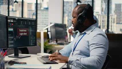 Stressed trader at work investigating suspicious access on trading account after system triggers warning. Broker worried about security popup on PC about attempted breach of client account