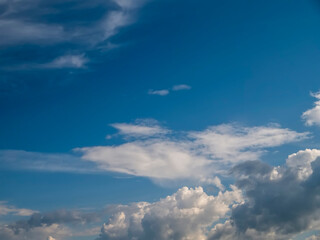 Fototapeta premium Cloudy blue sky. Nature background for design and special effects. Random shape and form.