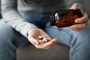 Cropped upset european young lady suffering from depression, grief and loneliness puts a lot of...