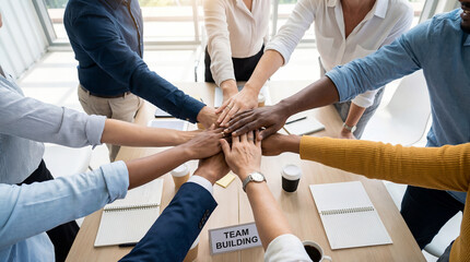 Team teamwork team building cooperation collaboration unity diverse office design team building meeting shows diverse hands join together unity