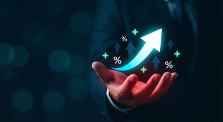 Conceptual image of financial growth showing upward arrow and percentage symbols in hand