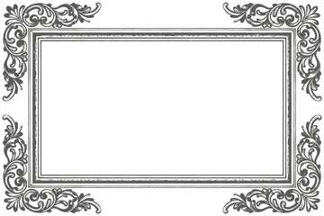 A beautiful black and white ornate frame with floral designs on a plain background