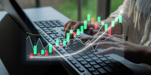 A business professional works intently on a laptop, analyzing financial data represented by colorful stock market graphs and charts, showcasing trends and growth. Impute