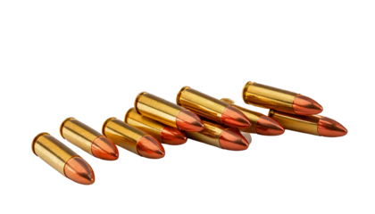 Ammunition bullets, with copper tips and silver casings scattered, isolated on a transparent