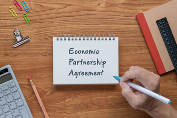 There is sticky note with the word Economic Partnership Agreement. It is as an eye-catching image.