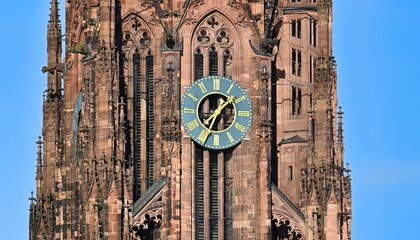 Gothic Tower of the Imperial Cathedral of Saint Bartholomew in Frankfurt with Clock