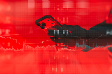 Hand hold smartphone over red digital background with falling financial chart and data visualization. Concept of market crash, stock volatility, trading risk, financial loss and economic uncertainty.