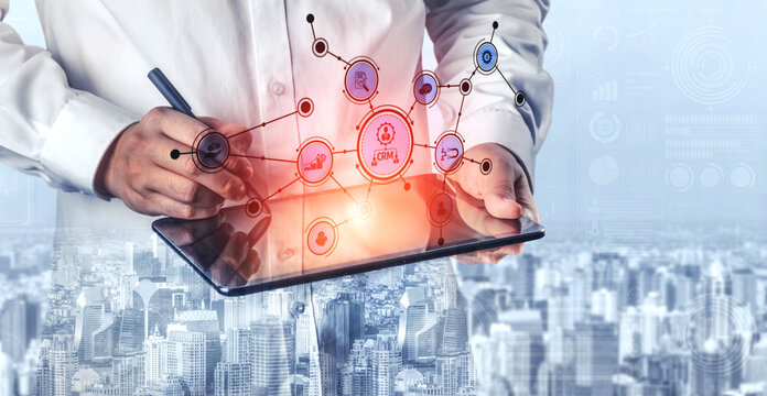 A business professional engages with a tablet to explore data trends and digital connections, enhanced by an urban city backdrop and data visualization elements. Tessel - Powered by Adobe