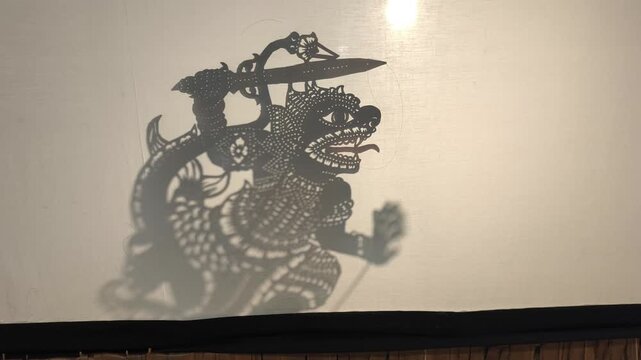Traditional wayang kulit puppets are displayed at the Kuala Lumpur Craft Museum. This shadow art is deeply rooted in Malaysian heritage. It is especially popular in Kelantan on the East Coast.