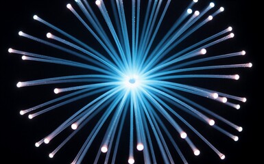 Naklejka premium Blue fiber optics radiate bright light, creating starburst effect against dark background.