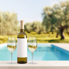 White wine bottle with blank label mockup and two filled glasses beside a pool