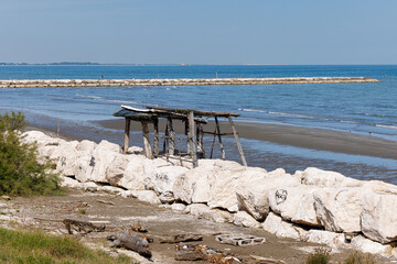 Wooden huts at the Murazzi beach on Venice Lido