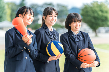 Basketball, high school girl holding volleyball, junior high school student, high school student,...