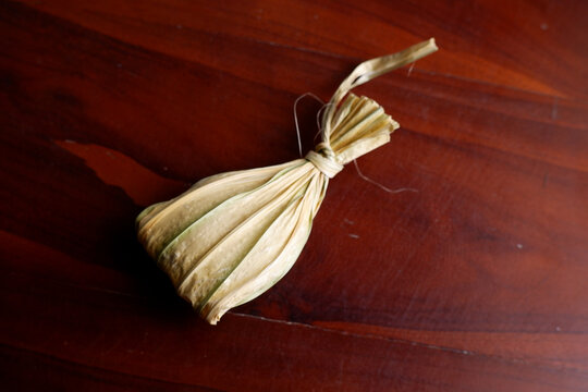 Gula Tapo, Traditional Indonesian Sweet Made from Palm Sugar Wrapped in Dried Palm Leaf