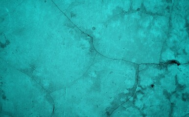 A vivid teal cracked surface texture suitable as a neutral background for graphic design, photography backdrops, or websites. The distressed