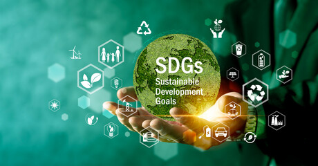 SDGs Sustainable Development Goals Concept with Green Earth in Hands and Eco Icons © jittawit.21