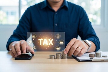 Businessman stacking coins with glowing virtual tax interface for financial management