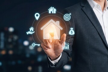 Businessman touching digital interface with house icons for real estate investment concept