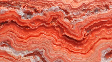 Patterns of red stone showing layers and textures in natural formation