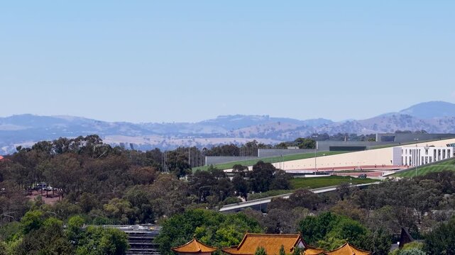 Wide Panning Shot of Parliament House and Canberra Cityscape Skyline