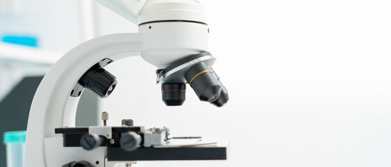 Scientist analyze biochemical samples in advanced scientific laboratory. Medical professional use microscope look microbiological developmental of viral. Biotechnology research in science lab.