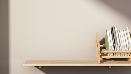 Books rack stand holder on floated hanging wooden shelf with sunlight shining on plain white wall.