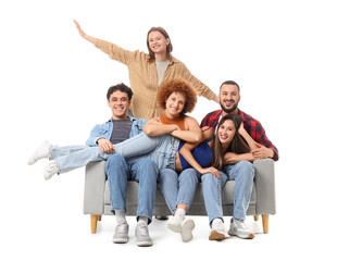 Obraz premium Happy diverse group of young friends sitting on sofa and posing together isolated on white background, cheerful men and women enjoying friendship and fun studio portrait