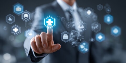 Fototapeta premium Business professional using technology to access healthcare icons with a medical cross symbol for modern healthcare solutions and digital health innovation