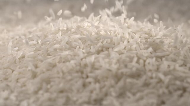 Super slow motion Pantry stockpile with flowing rice grains, Cinematic slowmotion of abundant grain spill