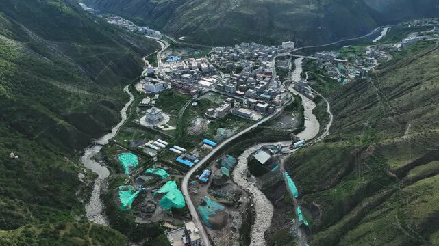 Breathtaking 4K UHD aerial and time-lapse footage of Daocheng Yading in Sichuan Province, a renowned natural reserve and tourist attraction famous for its Three Holy Mountains.