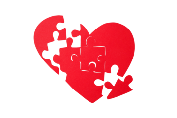 Red heart with puzzle pieces symbolizing unity, isolated, PNG