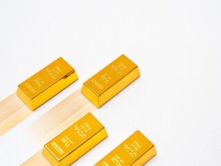 Gold bars moving forward with motion blur, representing rapid gold price growth, investment momentum, and financial opportunity. Perfect for finance, wealth building, and market trend content.