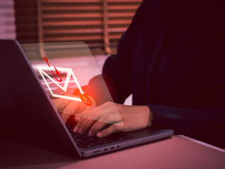 Phishing email alert icon on laptop computer screen. Concept of cyber fraud, scam, data theft, and phishing attacks. Perfect for illustrating digital threats, cybersecurity, and online risk awareness.