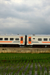 Passenger train traveling on railway tracks