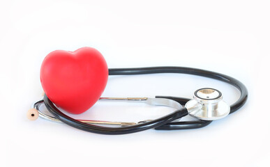 Medical stethoscope with red heart symbol, healthcare concept, white background.