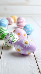 A colorful arrangement of beautifully decorated Easter eggs on a wooden surface, showcasing various patterns and vibrant colors.