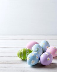 Colorful Easter eggs decorated with floral patterns arranged on a light wooden surface, evoking a festive and cheerful atmosphere.