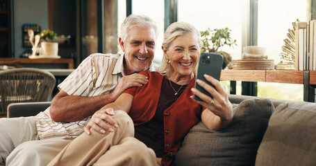 Video call, smile or old couple in house with phone, connection or online conversation in living room. Happy, senior man or woman with tech, digital communication or bonding together on virtual app.