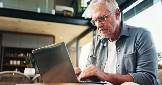 Old man, glasses and typing in home with laptop for asset management, retirement fund or prepare will. Senior person, browsing and email in house with computer, pension annuity and estate planning.