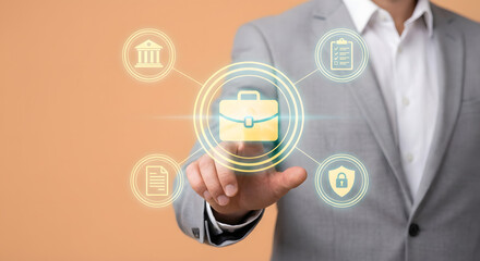 businessman in grey suit pointing at glowing yellow briefcase icon with connected digital symbols for corporate banking legal documents security and compliance management system