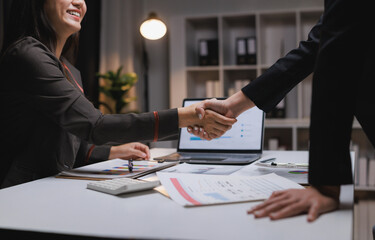 Business partners shaking hands making deal agreement