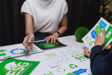 Business people analyzing esg sustainability report data