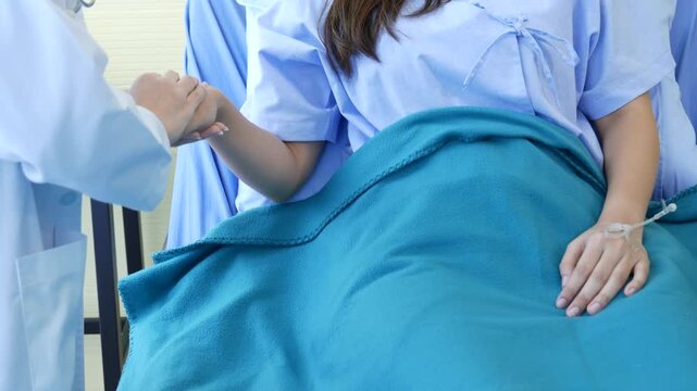 Asian women doctors using stethoscope listen respiratory rate from lungs diagnostics analyse patient in hospital medicare treatment clinic for medical healthcare chest cancer therapy using laptop.